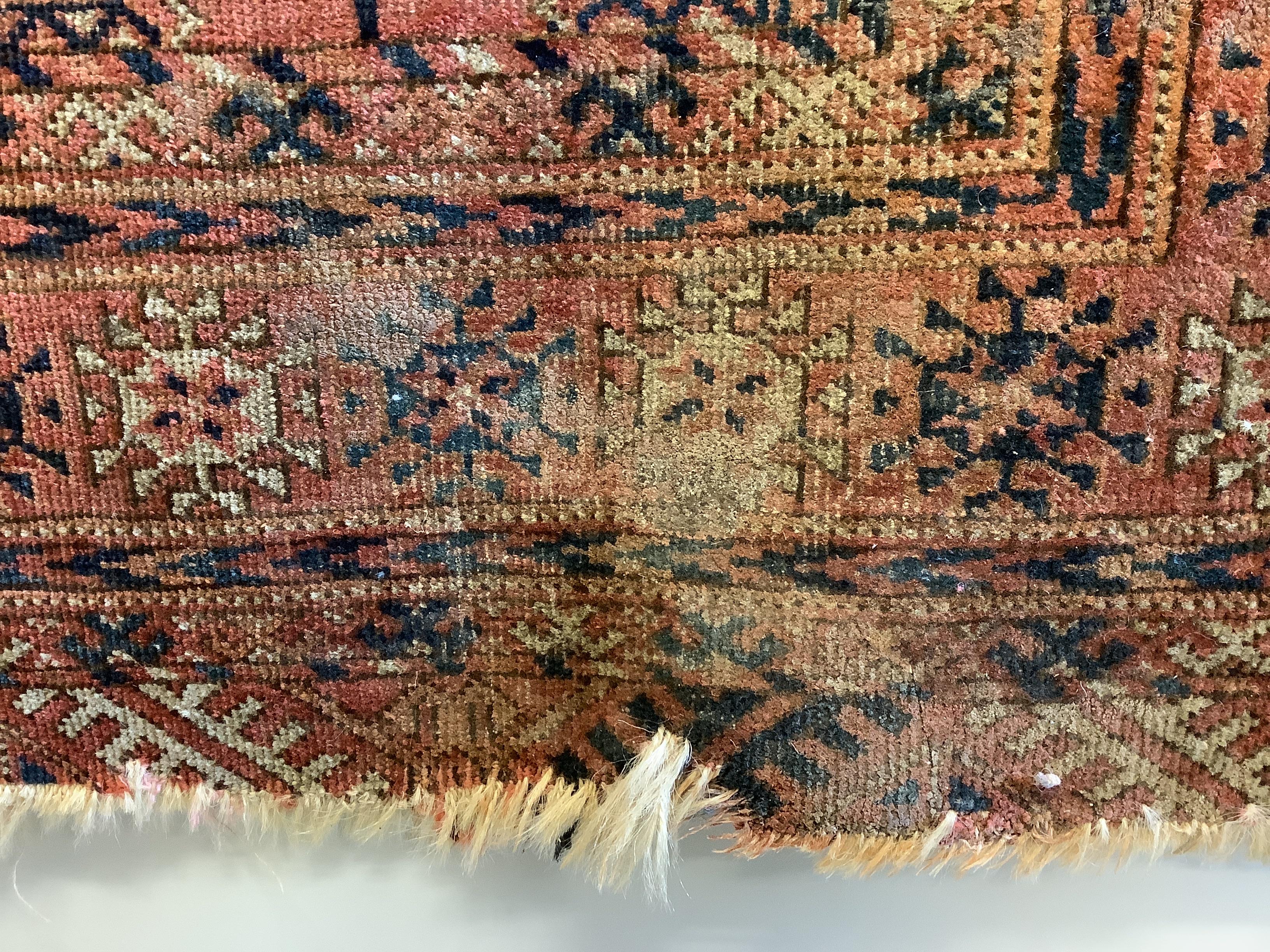 An antique Bokhara rug, 132 x 116cm